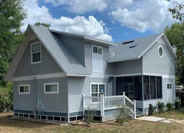 Brand new roof in April 2023.   This charming home has a enclosed front porch to relax in and enjoy a glass of wine or morning coffee.