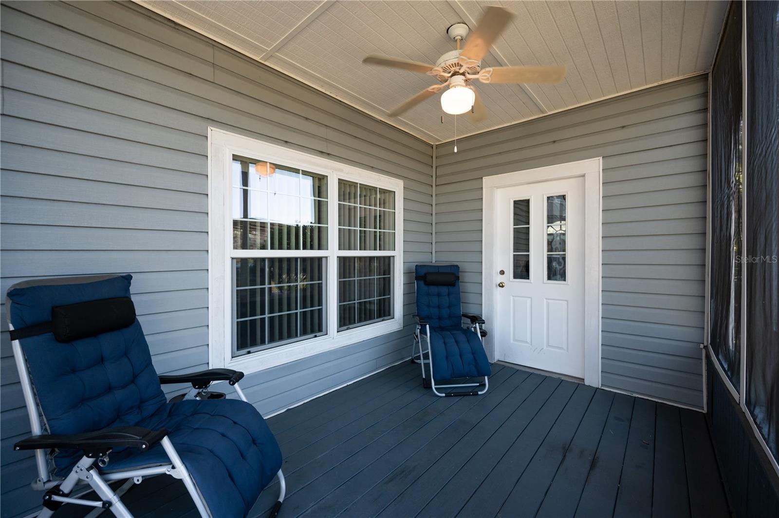 Enjoy your morning coffee on the front screened in porch