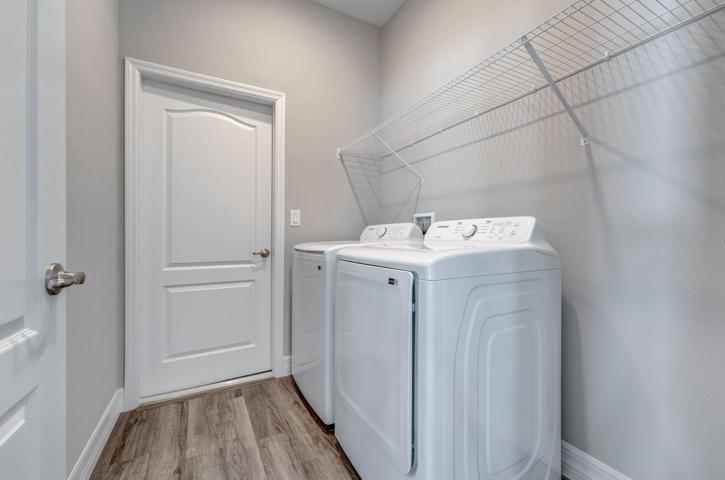 Laundry room with washer and dryer