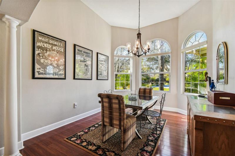 Separate dining for entertaining with bay windows