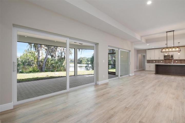 Open Floorplan - Family Room Facing Kitchen & Dining