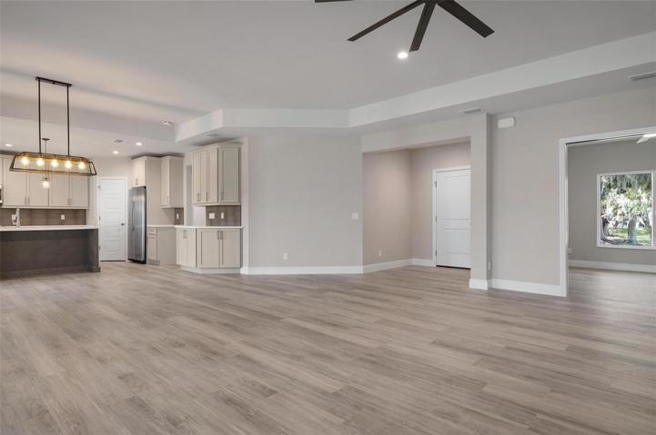 Open Floorplan - Family Room Facing Kitchen & Dining
