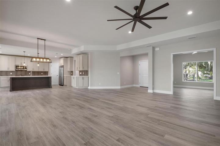 Open Floorplan - Family Room Facing Kitchen & Dining