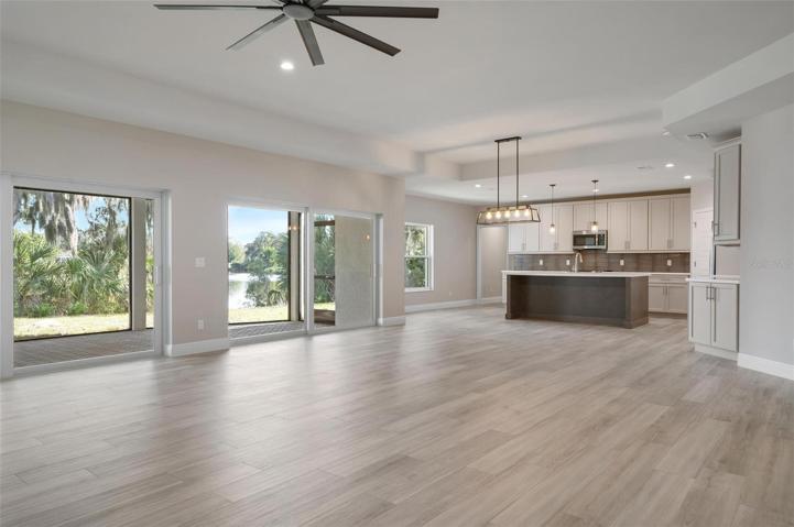Open Floorplan - Family Room Facing Kitchen & Dining