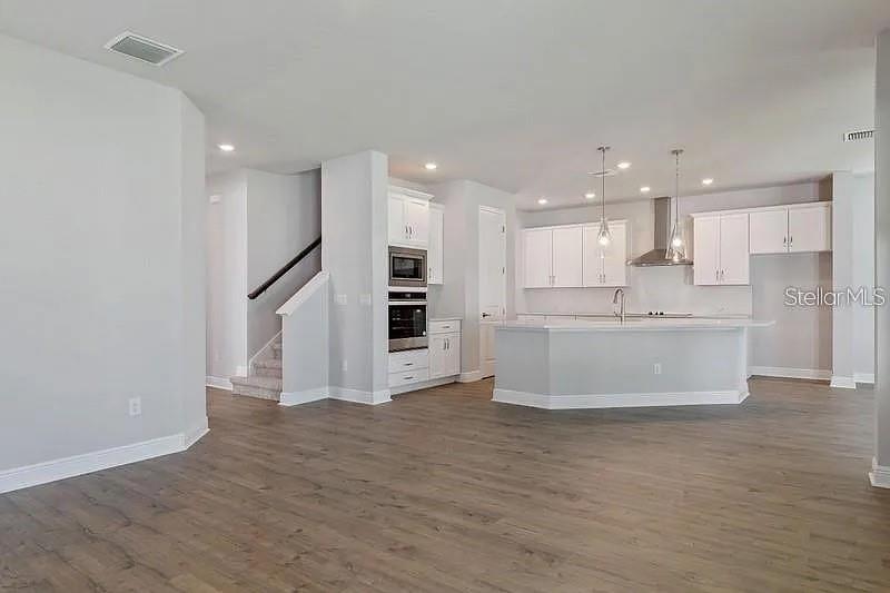 Family Room **Photos Are Of A Similar Home**