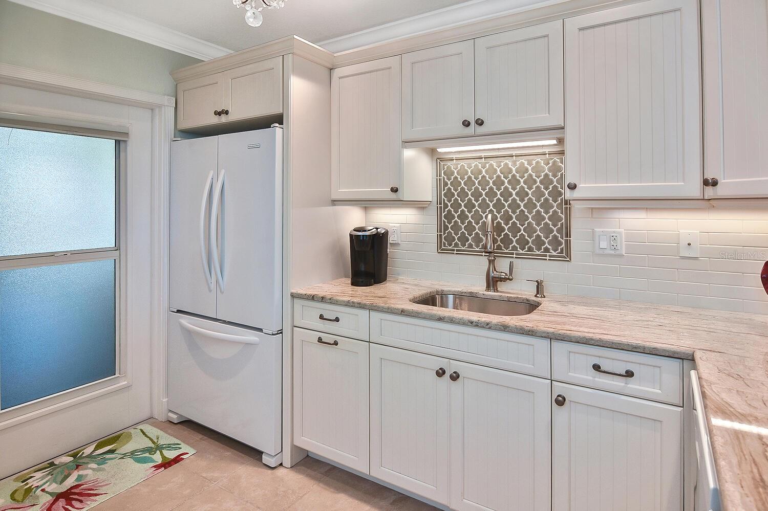 Attractive kitchen cabinets - pull out trash/recycle drawer