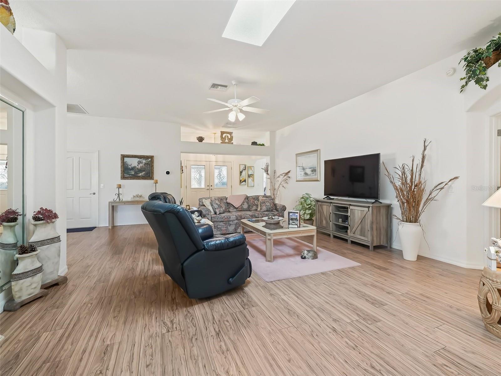 Living room - notice high ceilings and architectural details