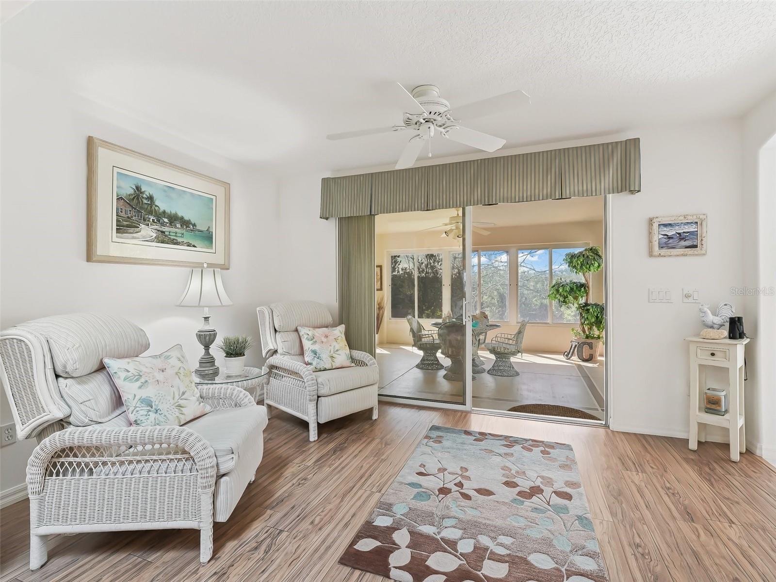 Sitting area at end of living room and before enclosed lanai