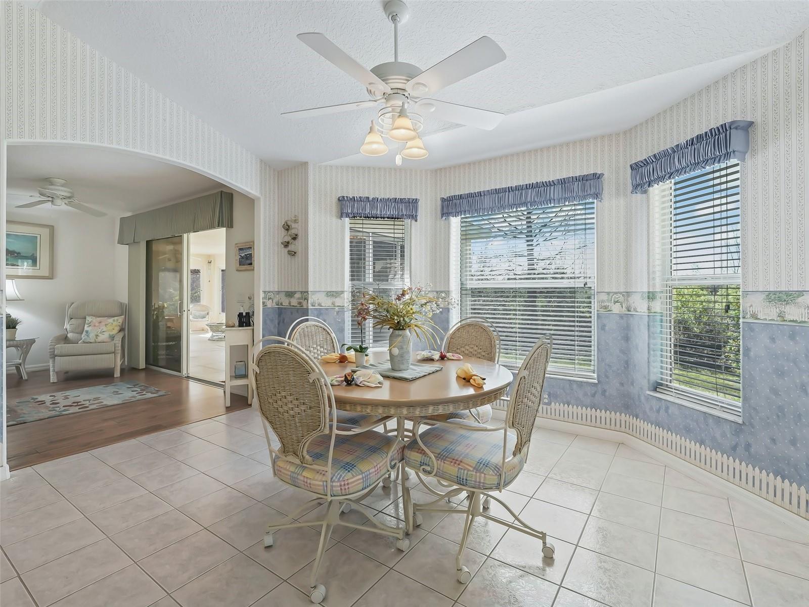 Eating area in kitchen and bay windows facing the Preserve