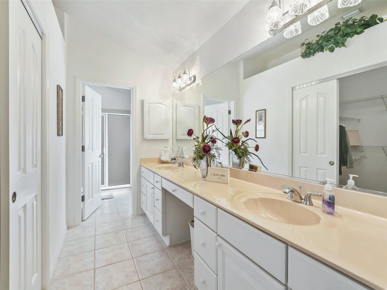 Large master bathroom double vanity sinks plenty of storage
