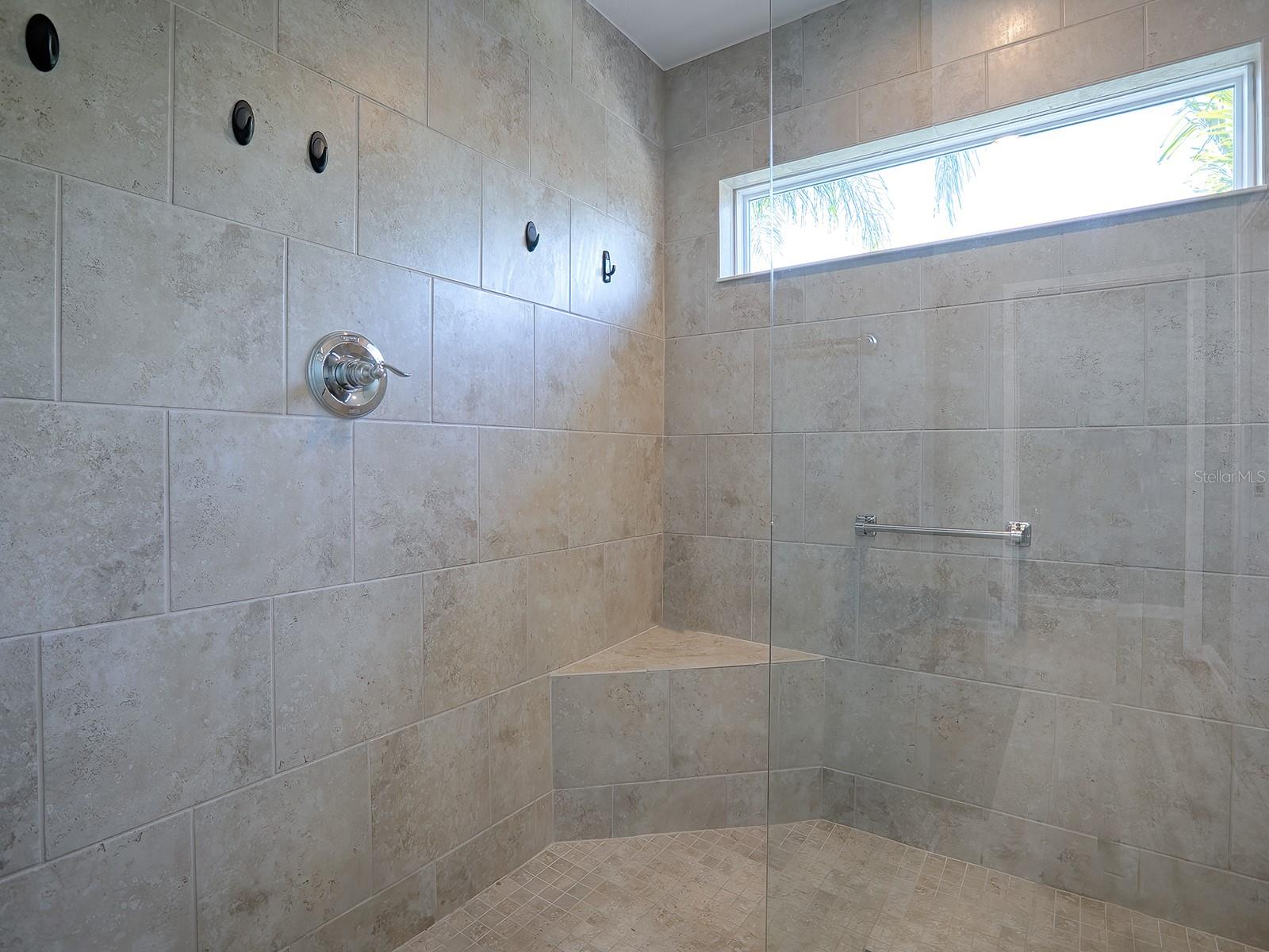 LARGE ROMAN SHOWER WITH WINDOW FOR NATURAL LIGHTING!