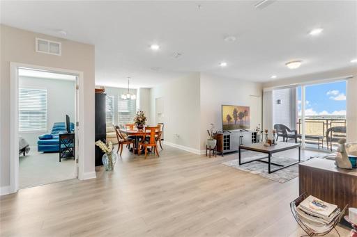 Great open living space with wood laminate floors throughout main areas