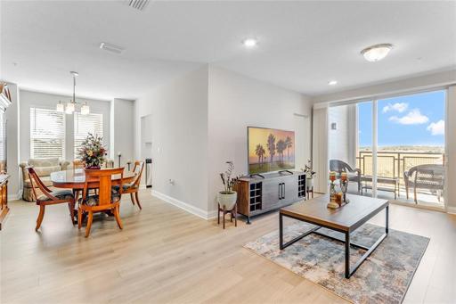Spacious family room and flex space with large sliding doors out to your covered patio