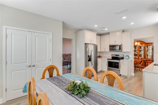 2 entrances into kitchen/dining area
