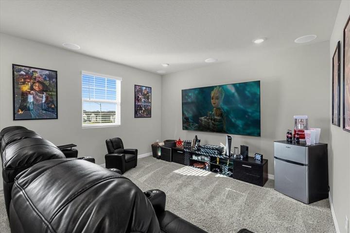 Movie theater/ Loft roomincludes 84'' TV and sound system