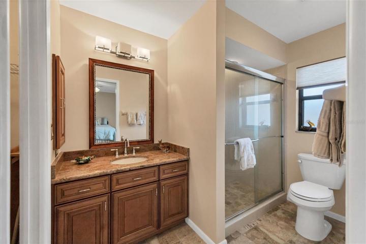 Updated mater bathroom with a walk in shower.