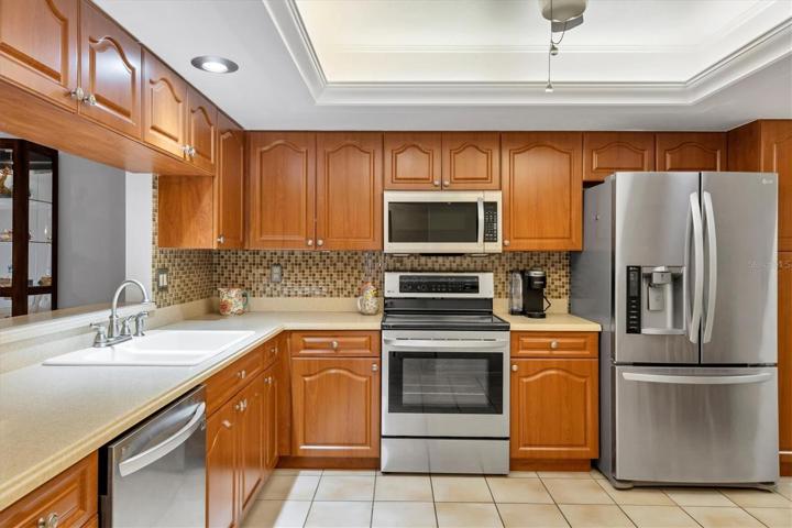 Kitchen Newer applianceWood Cabinets, stainless applicances