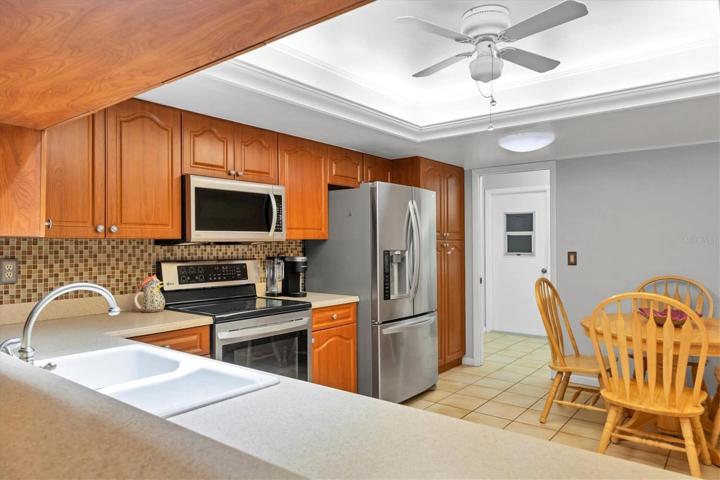 Kitchen Newer appliance,Corian counter topsCorinan counter tops wood cabnets