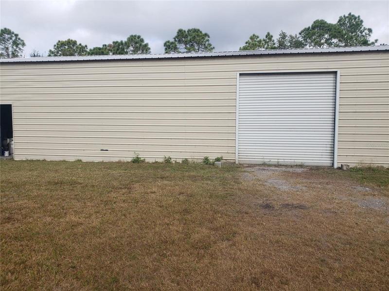 30 x 60 ft workshop wihttps://stellar.mlsmatrix.com/Matrix/MediaManager/ShowImage.aspx?tbl=9&mtid=1&tmui=683746483&mf=P6854969346aadb08f-7453-4107-b74b-4853d8895c1dU-1&w=128&h=96&q=99&md=2023-03-14%2022:28:43.070th 9000 lb lift