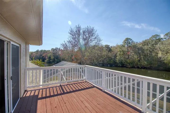 Upstairs deck overlooking the spring fed lake