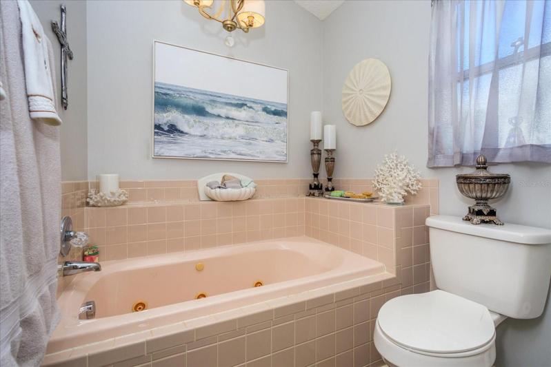 Separate Jacuzzi Soaking Tub & Water Closet w/ upgraded Lighting