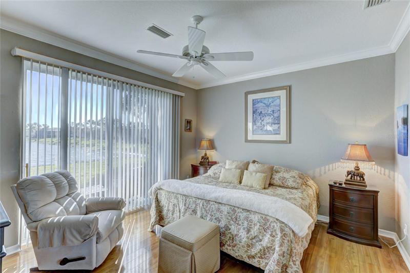master bedroom with slider to outside