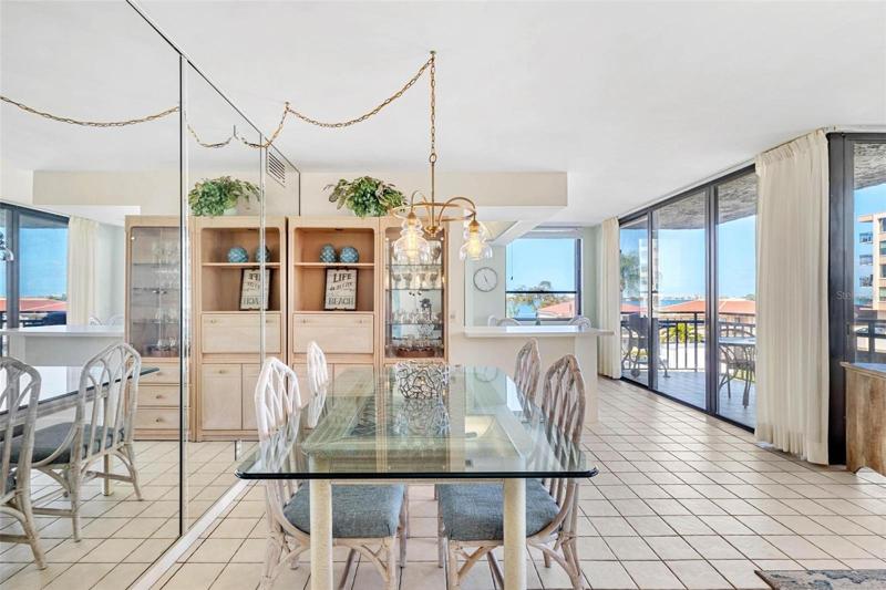 Open floor plan with dining/living and open kitchen ... and so much natural light!