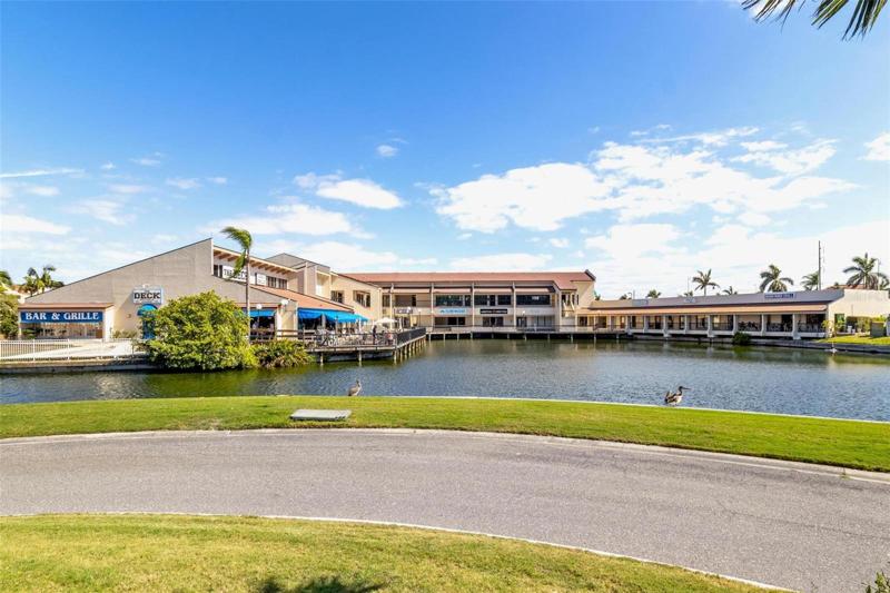 Isla del Sol Village Shopping area with restaurants, bars, yoga, coffee shop and more!  Just a short walk from home.