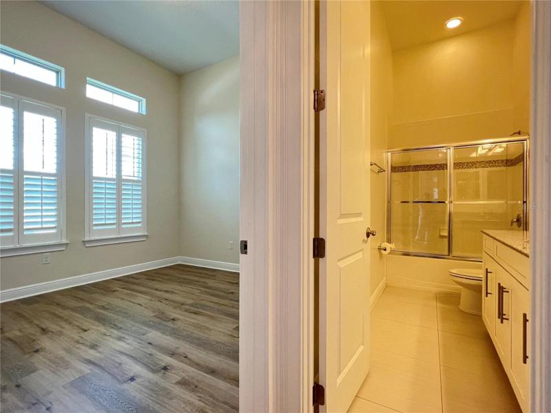 1st room to left upon entering with full bathroom