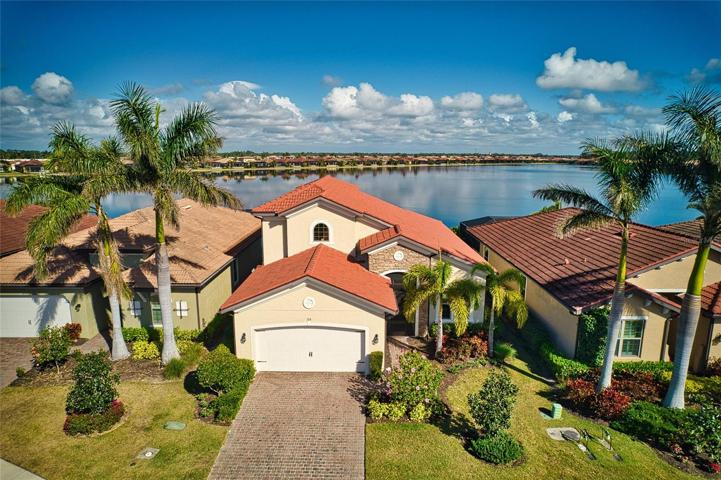 Aerial front of home with two car garage
