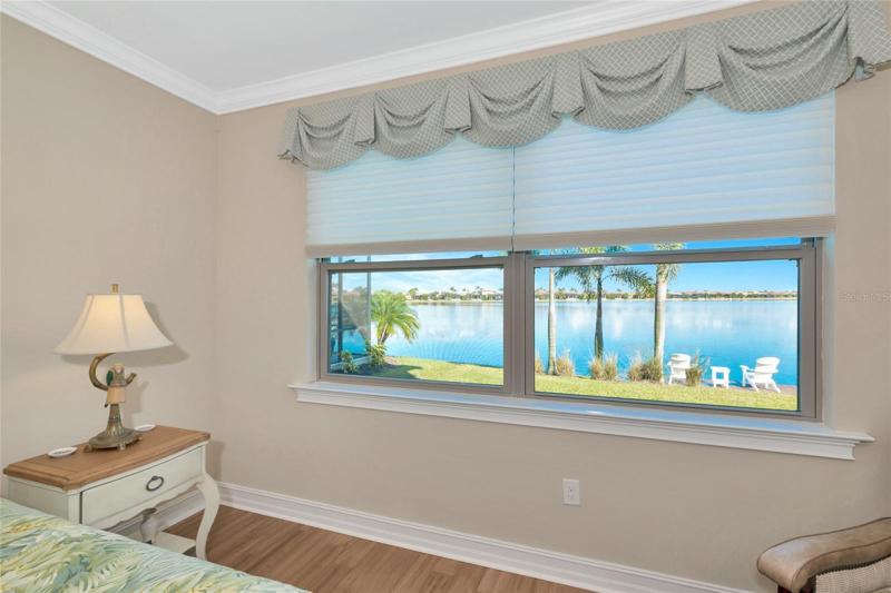 Master bedroom on the first floor with beautiful lake view