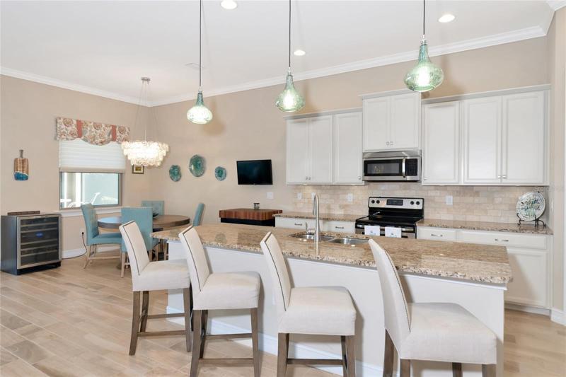 Beautiful kitchen including a corner pantry, eat in area and breakfast bar