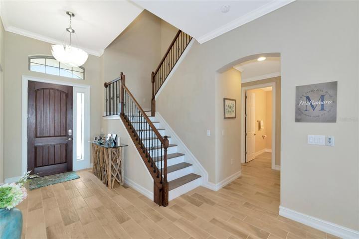 Stairs lead to the 2nd floor loft, two bedrooms and a full bathroom