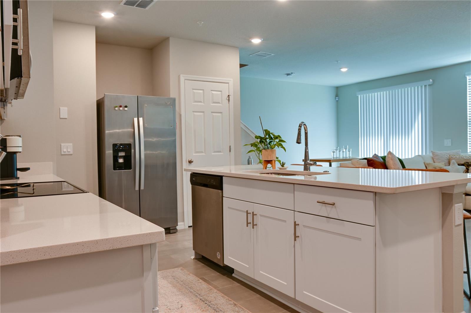 Kitchen Open to Living and Dining Space
