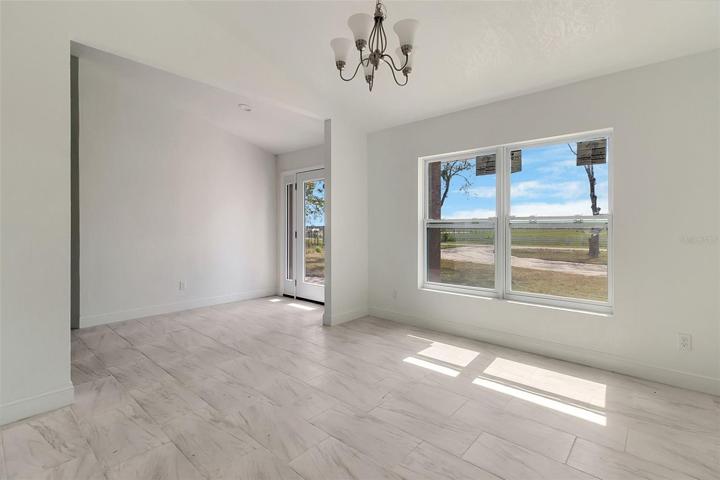 Formal dining view towards entrance and front of home
