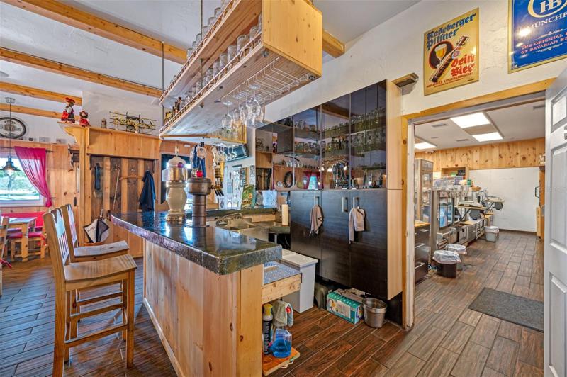 Restaurant (door open to the Retail Shop to show access to the Kitchen)