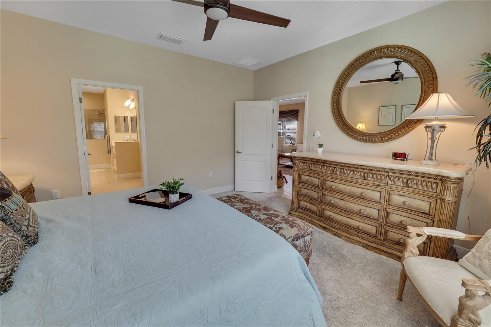 Primary Bedroom with ensuite and large walk-in closet with french doors