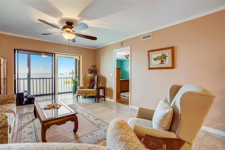 Front entryway to left, pass through from kitchen, dinning area to right.