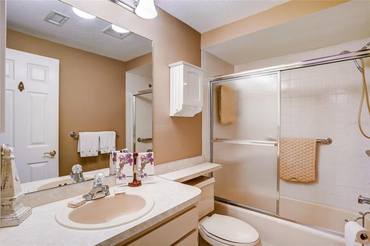 Looking towards front door. Guest bath, far left, guest bedroom, middle left, coat closet left of entry door.