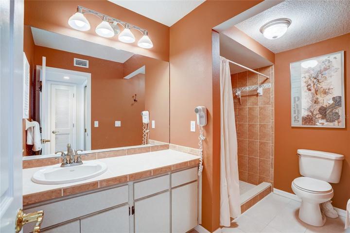 Master bathroom is easy to maneuver in.