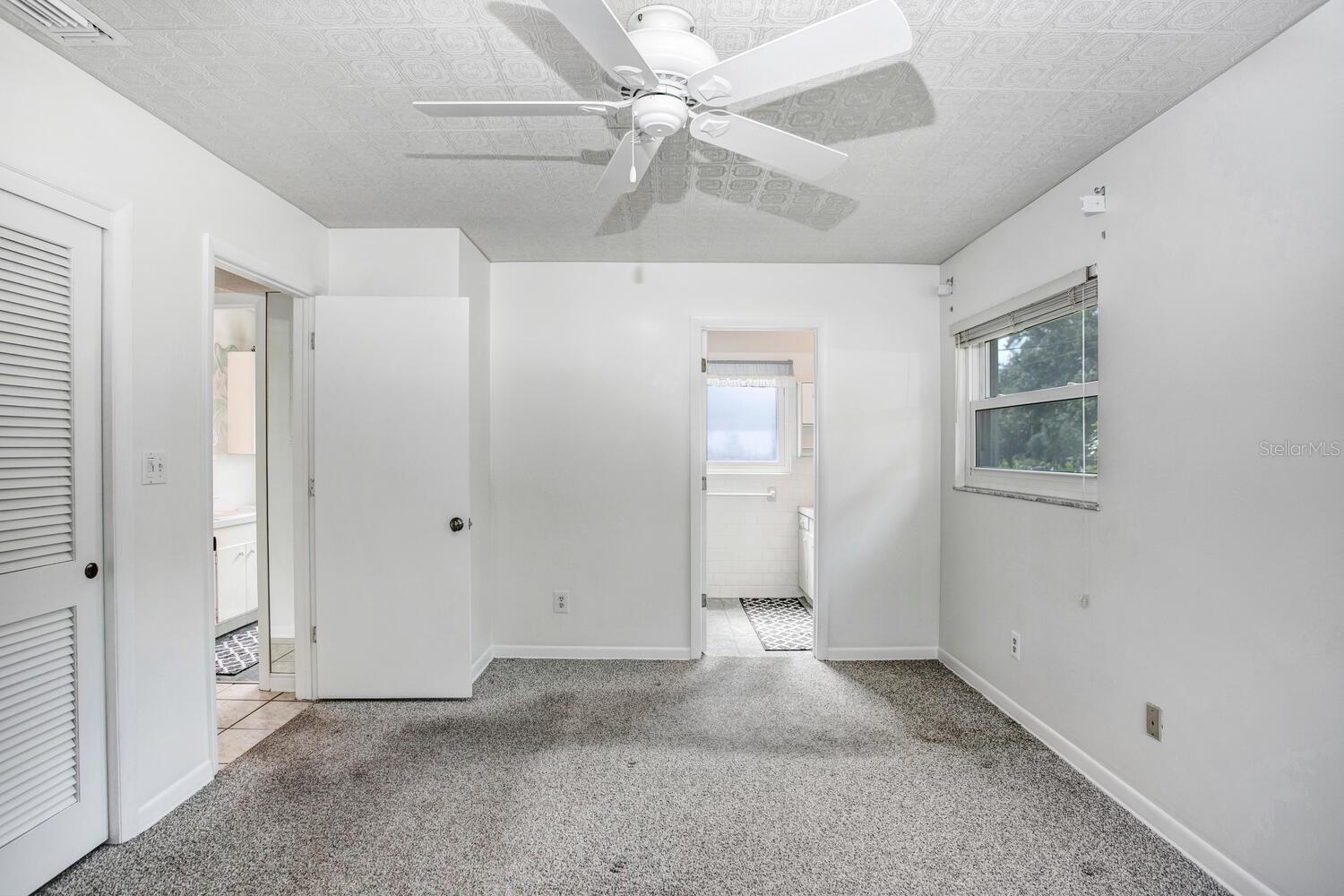Carpet is very easily replaceable!  Price reflects flooring needing to be changed.  Master bathroom is the doorway straight ahead.