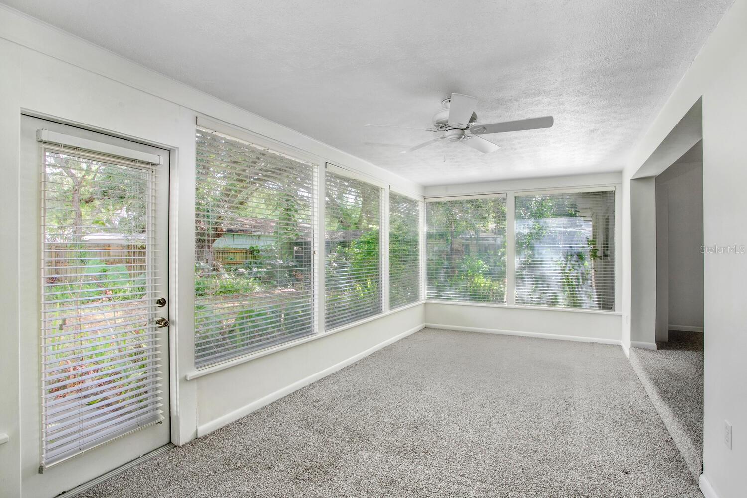 The Florida room looks out to the large, beautiful, very private, peaceful backyard!
