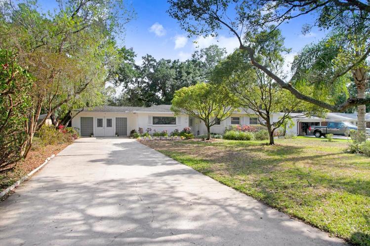 Every home on this street has a very long driveway.  The homes are well-spaced from each other too!