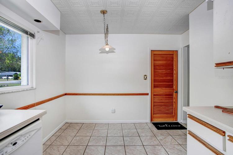 The door you see leads to the converted garage.