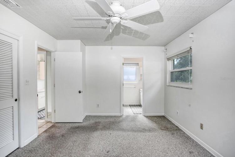 Carpet is very easily replaceable!  Price reflects flooring needing to be changed.  Master bathroom is the doorway straight ahead.