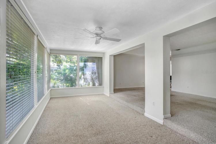 The Florida room is surrounded by windows!!!