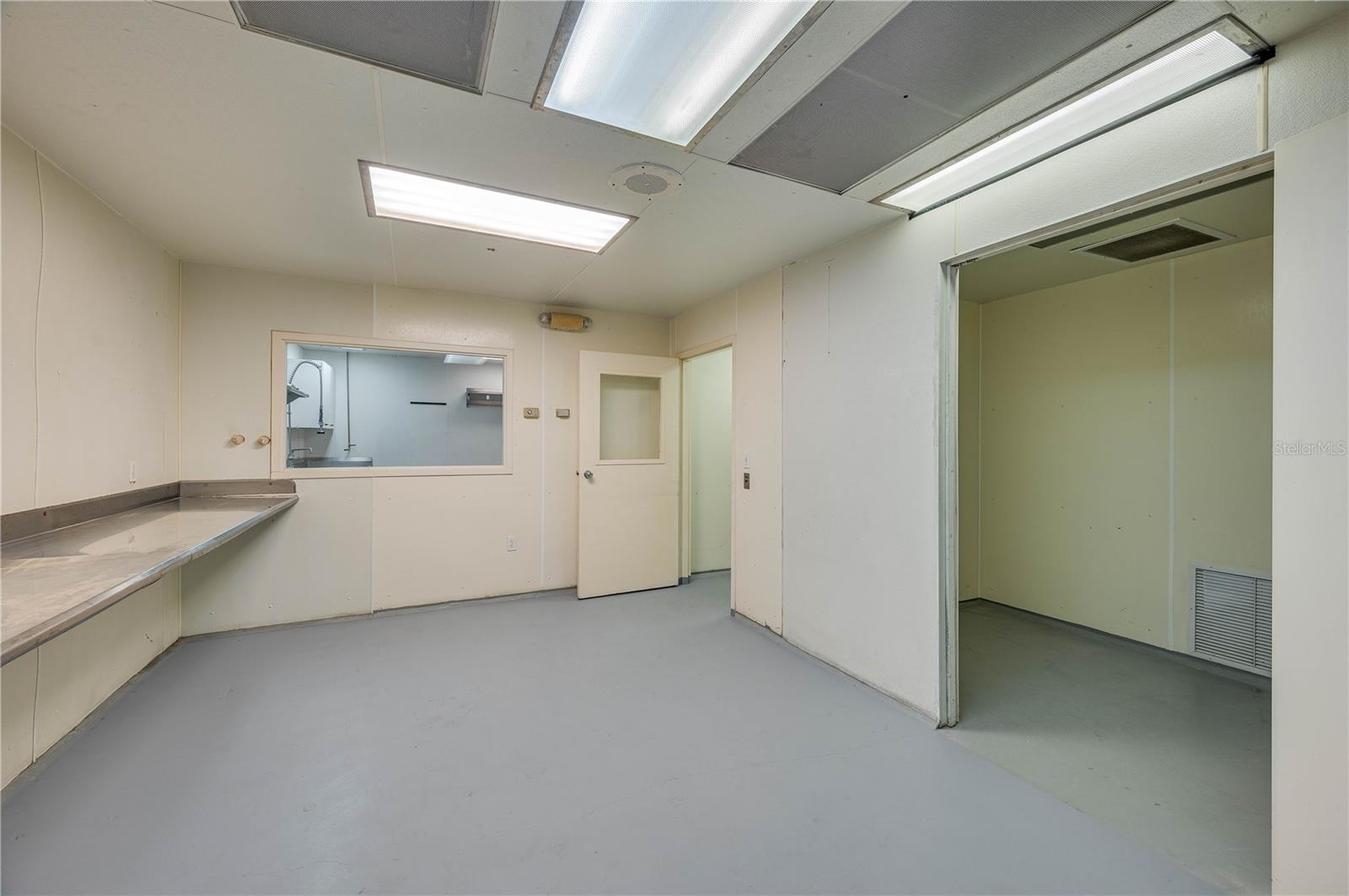 Closed room off main hallway