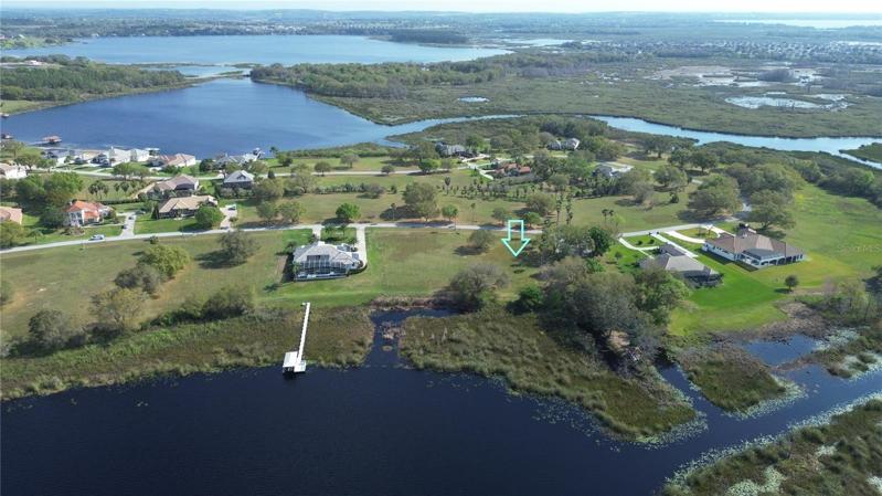 Gorgeous west facing lot with direct lake frontage and access to chain of lakes.