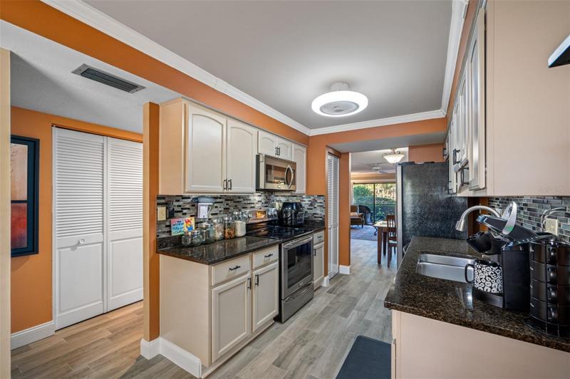 Kitchen located off the foyer entry.