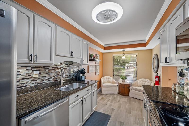 Custom wood cabinetry with granite countertop